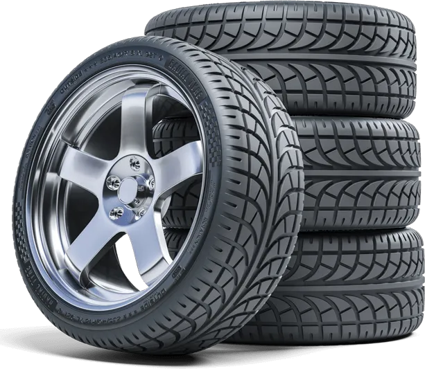 Stack of car tires and alloy wheel.